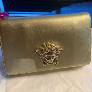 Gold Versace Medusa clutch